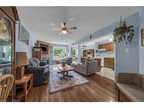 84 Frances Avenue, Stoney Creek, ON - Indoor Photo Showing Living Room With Fireplace