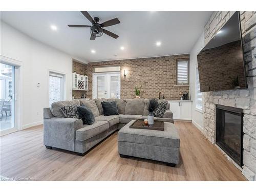 12 Cowper Court, Dundas, ON - Indoor Photo Showing Living Room With Fireplace