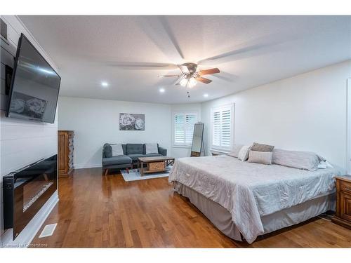 12 Cowper Court, Dundas, ON - Indoor Photo Showing Bedroom With Fireplace