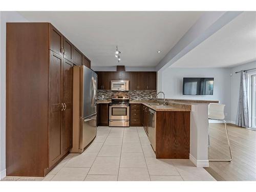 7-615 Rymal Road E, Hamilton, ON - Indoor Photo Showing Kitchen With Stainless Steel Kitchen