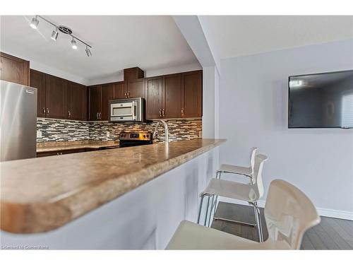 7-615 Rymal Road E, Hamilton, ON - Indoor Photo Showing Kitchen With Stainless Steel Kitchen With Double Sink With Upgraded Kitchen