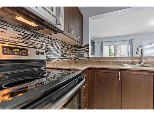 7-615 Rymal Road E, Hamilton, ON - Indoor Photo Showing Kitchen With Double Sink