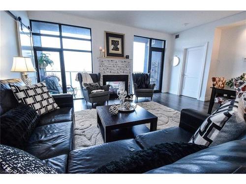 Ph412-38 Harbour Street, Port Dover, ON - Indoor Photo Showing Living Room With Fireplace