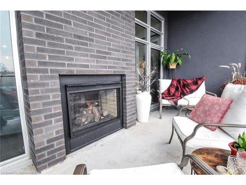 Ph412-38 Harbour Street, Port Dover, ON - Indoor Photo Showing Living Room With Fireplace