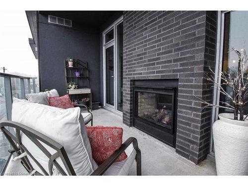 Ph412-38 Harbour Street, Port Dover, ON - Indoor Photo Showing Living Room With Fireplace