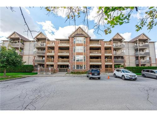 303-4003 Kilmer Drive, Burlington, ON - Outdoor With Balcony With Facade