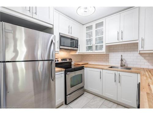 303-4003 Kilmer Drive, Burlington, ON - Indoor Photo Showing Kitchen