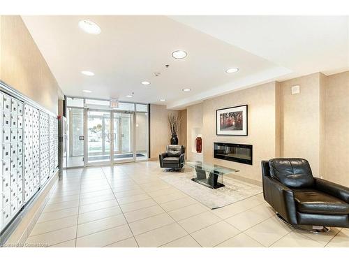 331-5317 Upper Middle Road, Burlington, ON - Indoor Photo Showing Other Room With Fireplace