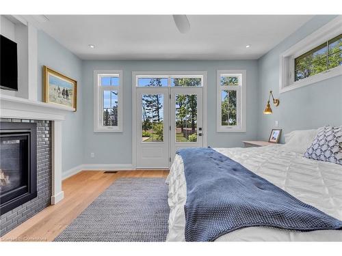 42 Parsonage Road, Ancaster, ON - Indoor Photo Showing Bedroom With Fireplace