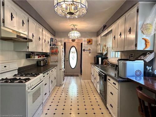 82 Concession 5 Road, Fisherville, ON - Indoor Photo Showing Kitchen With Double Sink