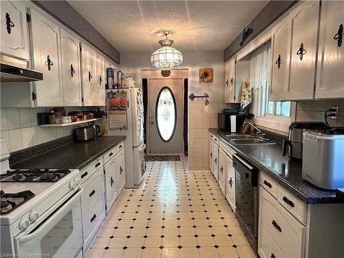 82 Concession 5 Road, Fisherville, ON - Indoor Photo Showing Kitchen With Double Sink