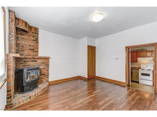 18 Fairholt Road N, Hamilton, ON - Indoor With Fireplace