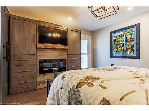 317 Glenholme Avenue, Hamilton, ON - Indoor Photo Showing Bedroom With Fireplace