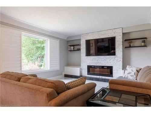 317 Glenholme Avenue, Hamilton, ON - Indoor Photo Showing Living Room With Fireplace