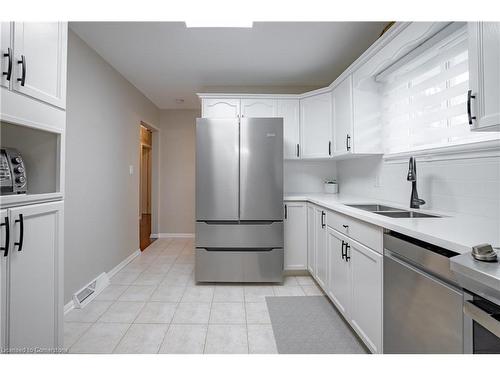 27 Warkdale Drive W, St. Catharines, ON - Indoor Photo Showing Kitchen With Double Sink