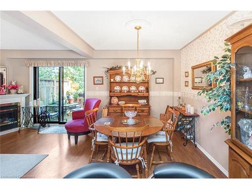 10-54 Argyle Street S, Caledonia, ON - Indoor Photo Showing Dining Room With Fireplace