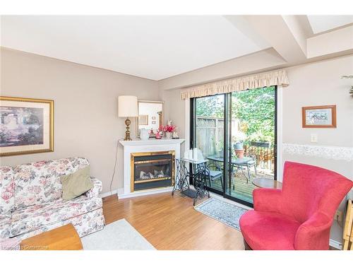 10-54 Argyle Street S, Caledonia, ON - Indoor Photo Showing Living Room With Fireplace