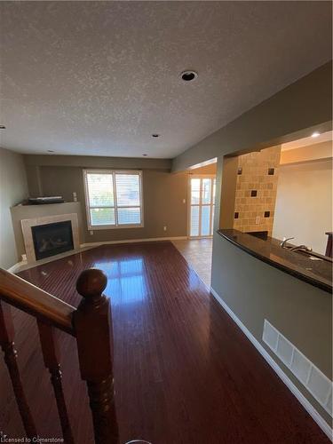 69 Cedarville Drive, Hamilton, ON - Indoor Photo Showing Other Room With Fireplace