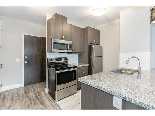 418-118 King Street E, Hamilton, ON - Indoor Photo Showing Kitchen With Stainless Steel Kitchen With Double Sink With Upgraded Kitchen