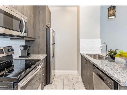 418-118 King Street E, Hamilton, ON - Indoor Photo Showing Kitchen With Double Sink