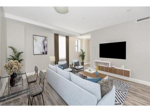 418-118 King Street E, Hamilton, ON - Indoor Photo Showing Living Room