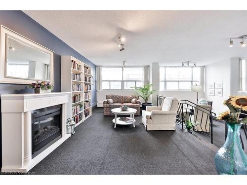 501-2263 Marine Drive, Oakville, ON - Indoor Photo Showing Living Room With Fireplace