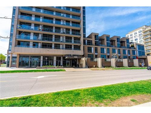 404-1940 Ironstone Drive, Burlington, ON - Outdoor With Balcony With Facade