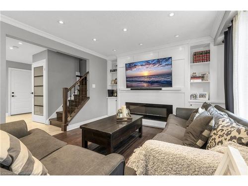 65 Memorial Avenue, Stoney Creek, ON - Indoor Photo Showing Living Room With Fireplace