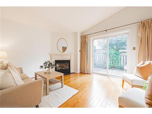 3-3333 New Street, Burlington, ON - Indoor Photo Showing Living Room With Fireplace