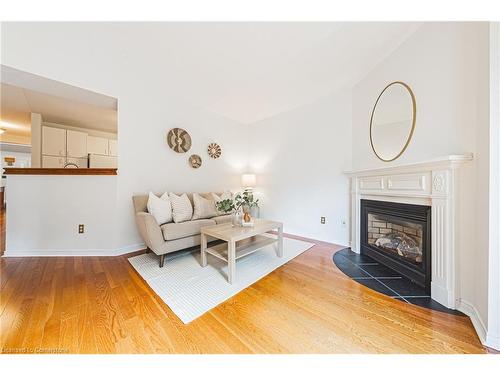 3-3333 New Street, Burlington, ON - Indoor Photo Showing Living Room With Fireplace