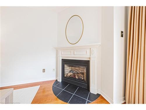 3-3333 New Street, Burlington, ON - Indoor Photo Showing Living Room With Fireplace