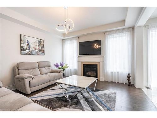 39 Avanti Crescent, Waterdown, ON - Indoor Photo Showing Living Room With Fireplace