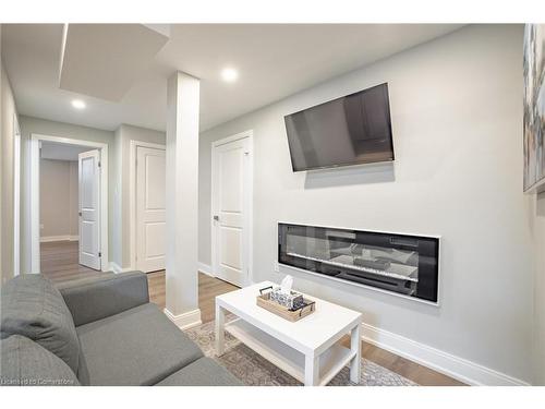 4 Lockman Drive, Ancaster, ON - Indoor Photo Showing Living Room With Fireplace