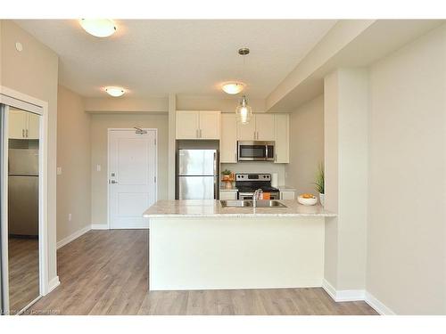 214-101 Shoreview Place, Stoney Creek, ON - Indoor Photo Showing Kitchen With Double Sink