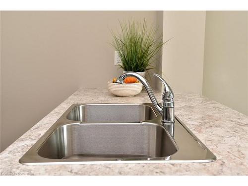 214-101 Shoreview Place, Stoney Creek, ON - Indoor Photo Showing Kitchen With Double Sink