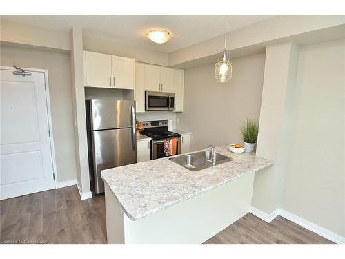 214-101 Shoreview Place, Stoney Creek, ON - Indoor Photo Showing Kitchen With Double Sink