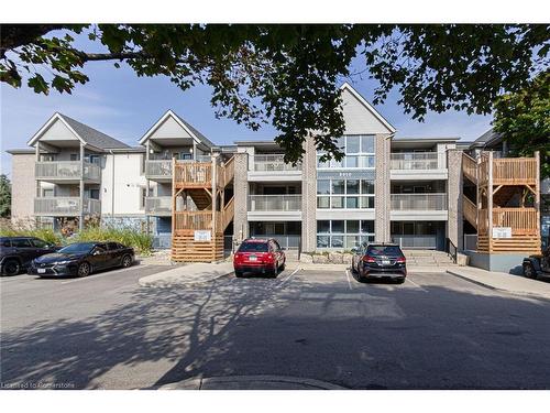 103-2010 Cleaver Avenue, Burlington, ON - Outdoor With Balcony With Facade