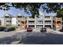 103-2010 Cleaver Avenue, Burlington, ON  - Outdoor With Balcony With Facade 