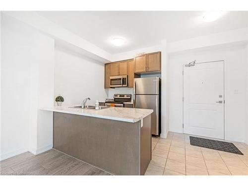 113-101 Shoreview Place, Stoney Creek, ON - Indoor Photo Showing Kitchen With Stainless Steel Kitchen With Double Sink