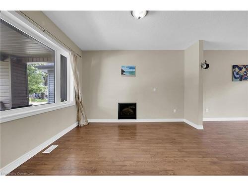 31 Gibson Avenue, Hamilton, ON - Indoor Photo Showing Other Room With Fireplace