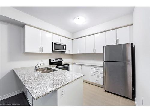 203-2393 Bronte Road, Oakville, ON - Indoor Photo Showing Kitchen With Double Sink