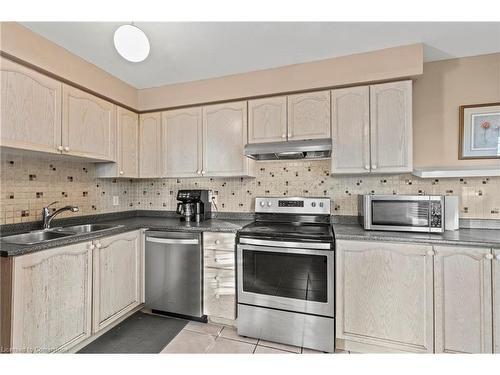 50-565 Rymal Road E, Hamilton, ON - Indoor Photo Showing Kitchen With Double Sink