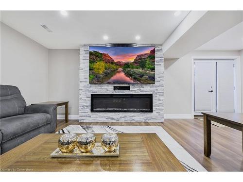 68 First Road W, Stoney Creek, ON - Indoor Photo Showing Living Room With Fireplace