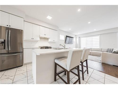 49 Richard William Drive, Caledonia, ON - Indoor Photo Showing Kitchen With Stainless Steel Kitchen With Double Sink With Upgraded Kitchen