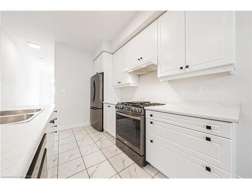 49 Richard William Drive, Caledonia, ON - Indoor Photo Showing Kitchen With Stainless Steel Kitchen With Double Sink