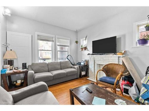 33 Cline Avenue N, Hamilton, ON - Indoor Photo Showing Living Room With Fireplace