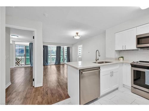 709-30 Grand Trunk Crescent, Toronto, ON - Indoor Photo Showing Kitchen With Double Sink