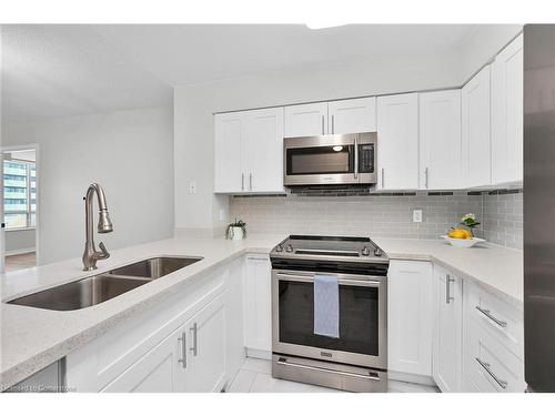 709-30 Grand Trunk Crescent, Toronto, ON - Indoor Photo Showing Kitchen With Double Sink