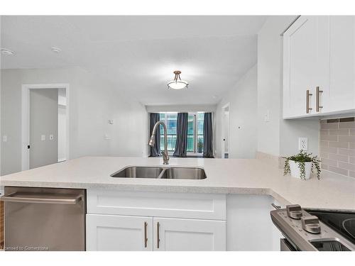 709-30 Grand Trunk Crescent, Toronto, ON - Indoor Photo Showing Kitchen With Double Sink