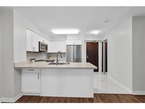 709-30 Grand Trunk Crescent, Toronto, ON - Indoor Photo Showing Kitchen With Double Sink